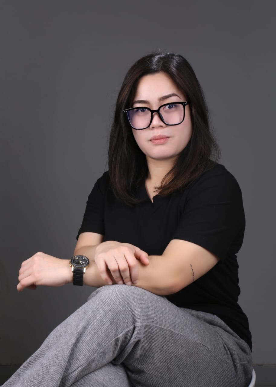 Czarina Agoncillo, trauma-informed and neurodivergent-affirming author, portrait photograph